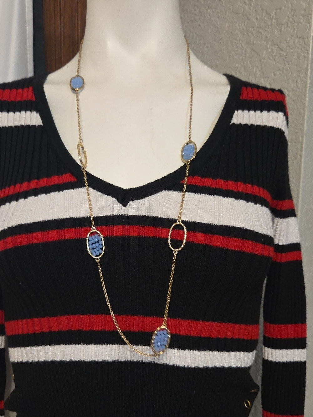 Gold Long Necklace with Light Blue Stone Accents by